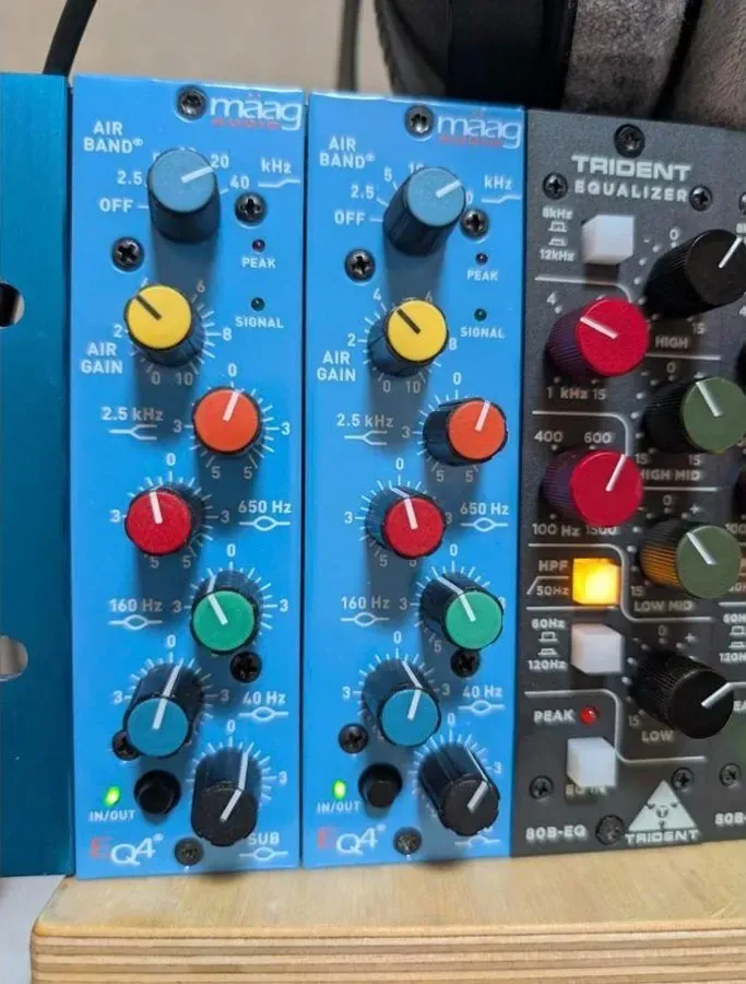 Two blue Maag EQ4 modules next to a Trident 80B equalizer