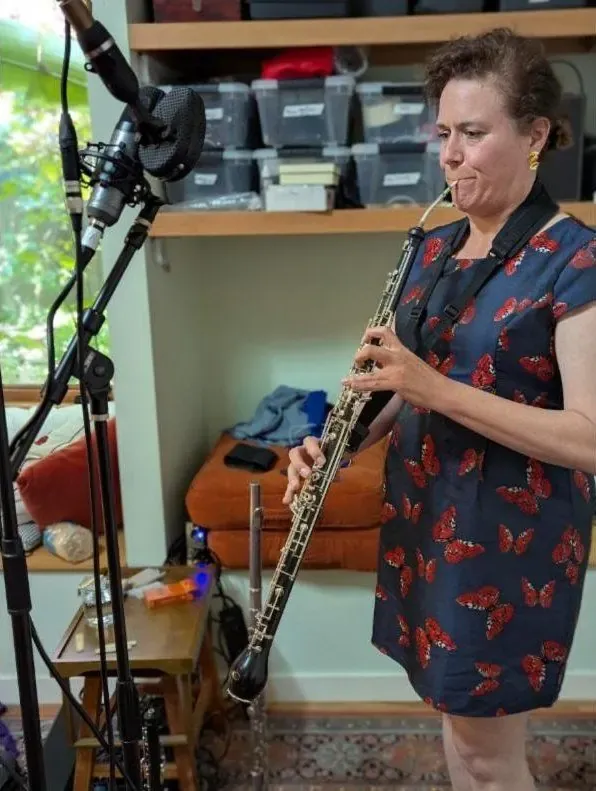 Woodwind player on a double reed at a close mic